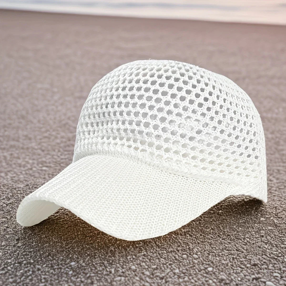 Casquette ajourée avec visière courbée et structure souple