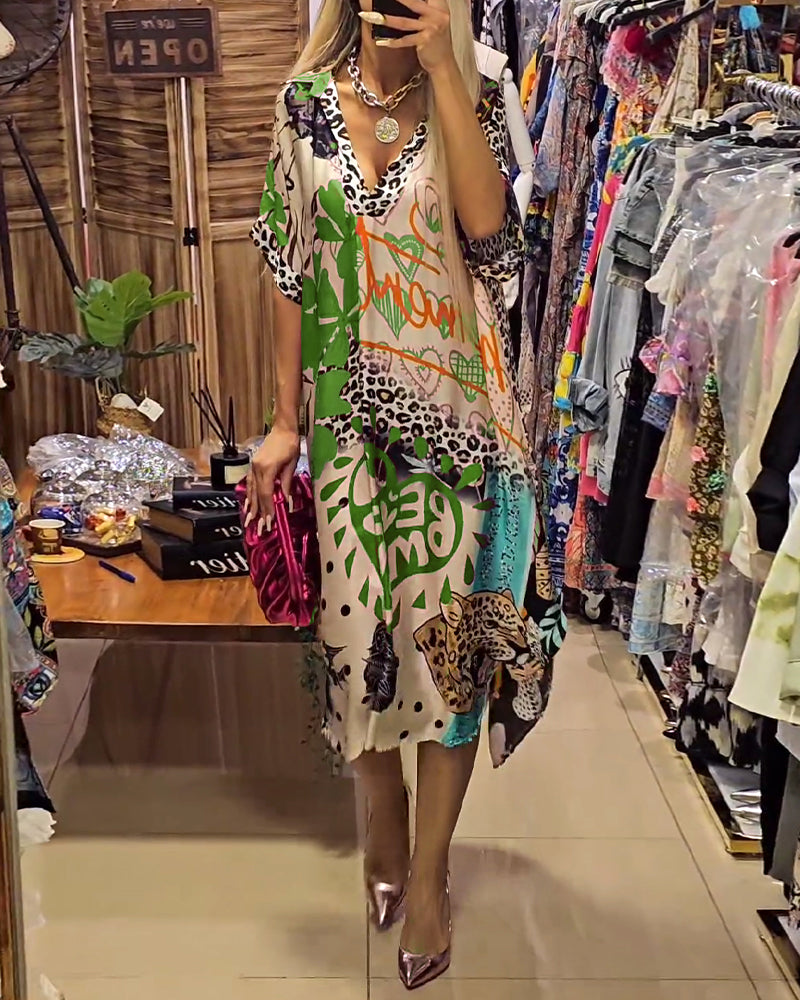 Robe mi-longue ample à encolure en V décorative et motif intégral varié