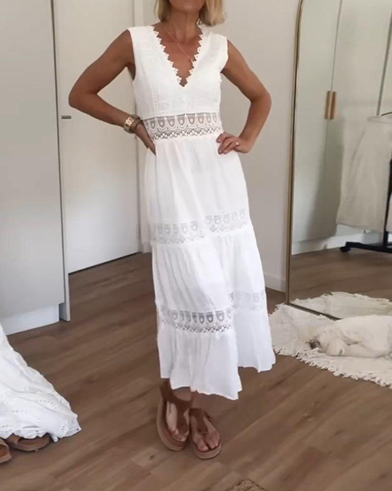 Robe longue sans manches avec détails ajourés et décolleté en V
