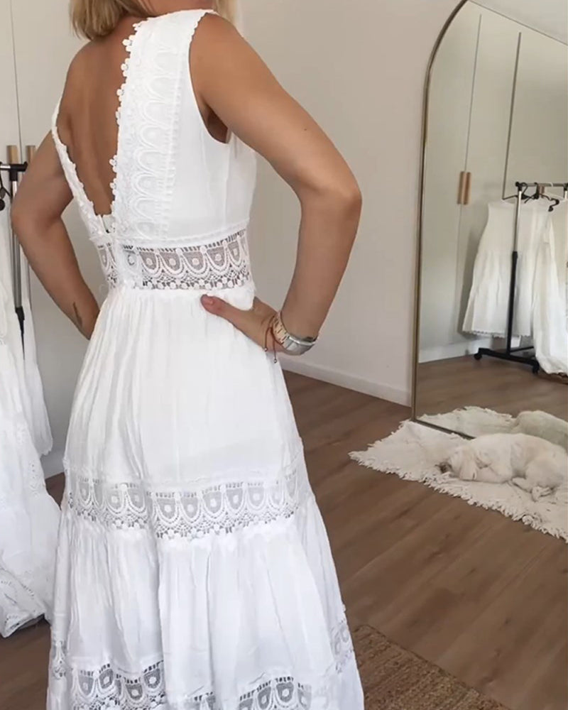 Robe longue sans manches avec détails ajourés et décolleté en V