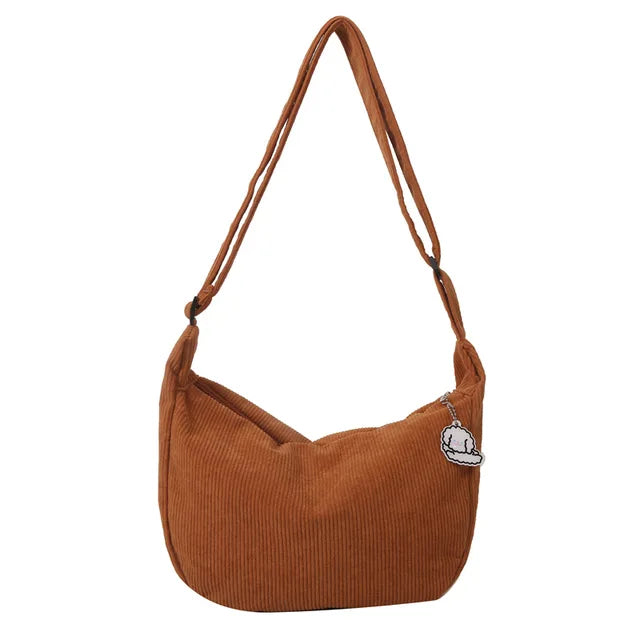 Sac d’épaule souple avec sangle longue et fermeture supérieure