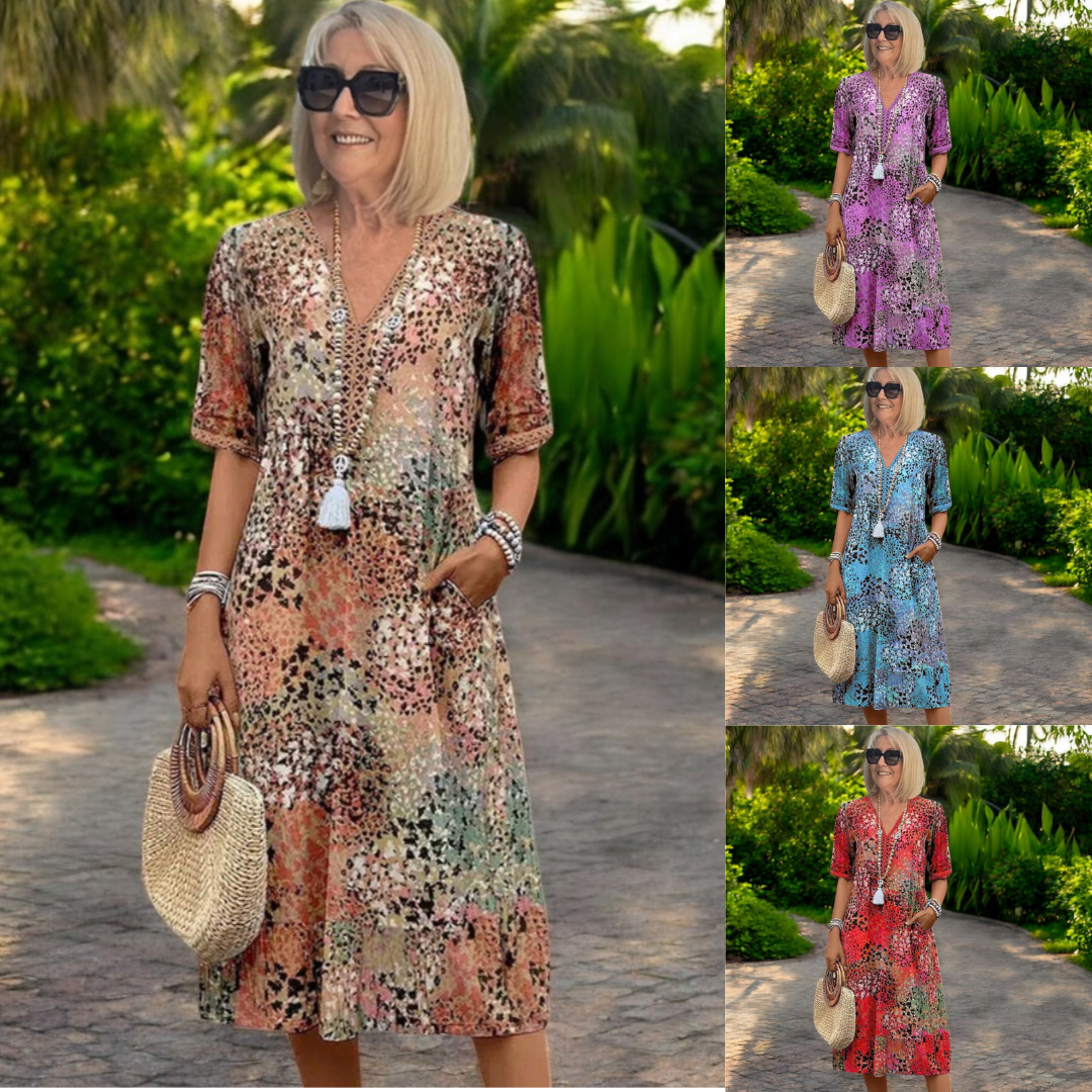 Robe mi-longue à manches courtes, encolure en V et boutons décoratifs