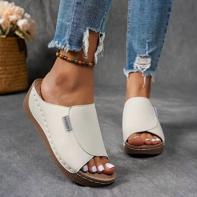 Mules ouvertes à semelle surélevée avec couture visible