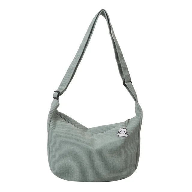 Sac d’épaule souple avec sangle longue et fermeture supérieure
