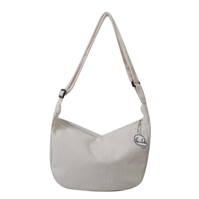 Sac d’épaule souple avec sangle longue et fermeture supérieure