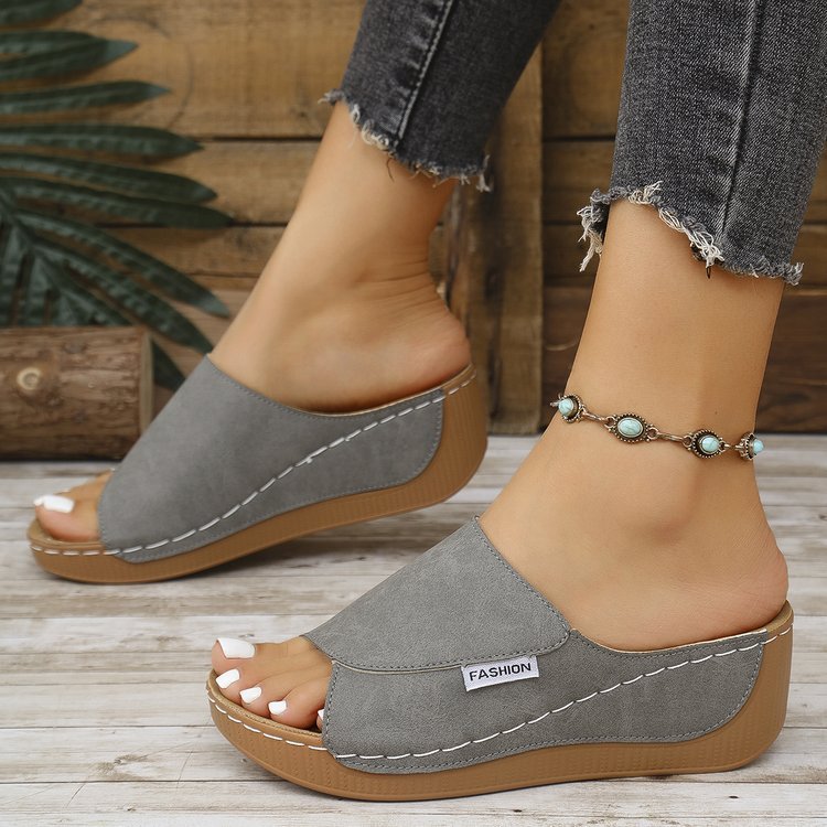 Mules ouvertes à semelle surélevée avec couture visible