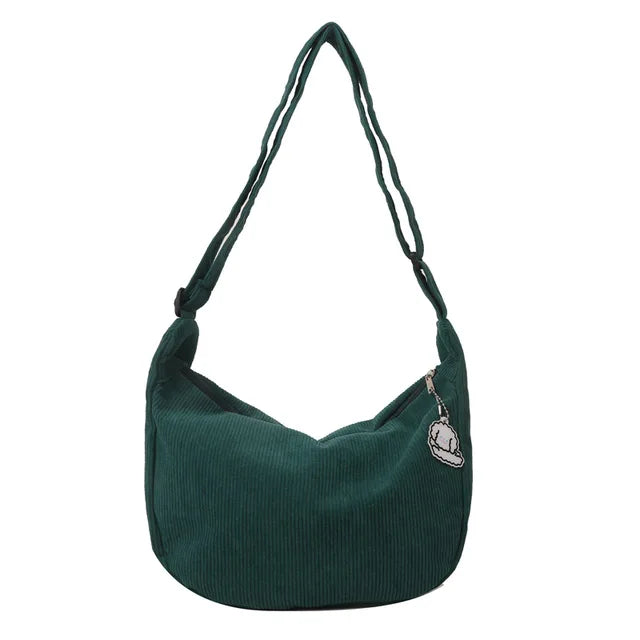 Sac d’épaule souple avec sangle longue et fermeture supérieure