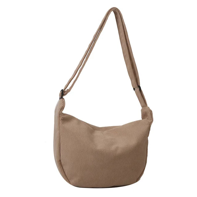Sac d’épaule souple avec sangle longue et fermeture supérieure