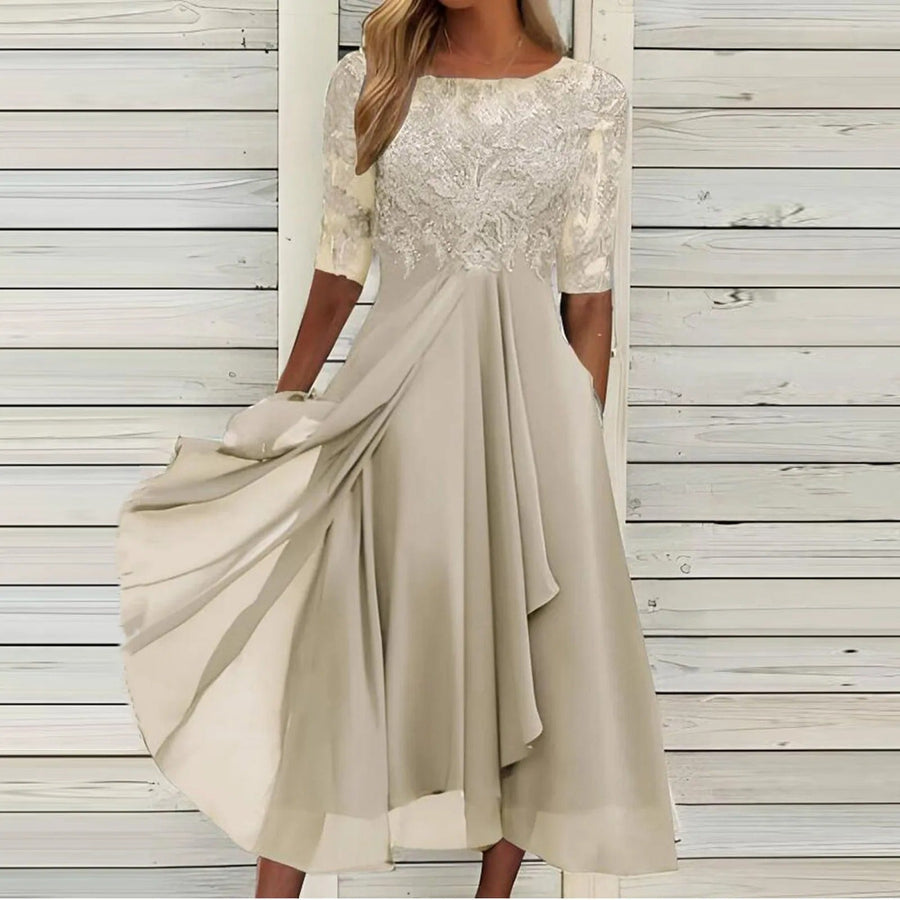 Robe mi-longue à manches mi-longues et jupe fluide