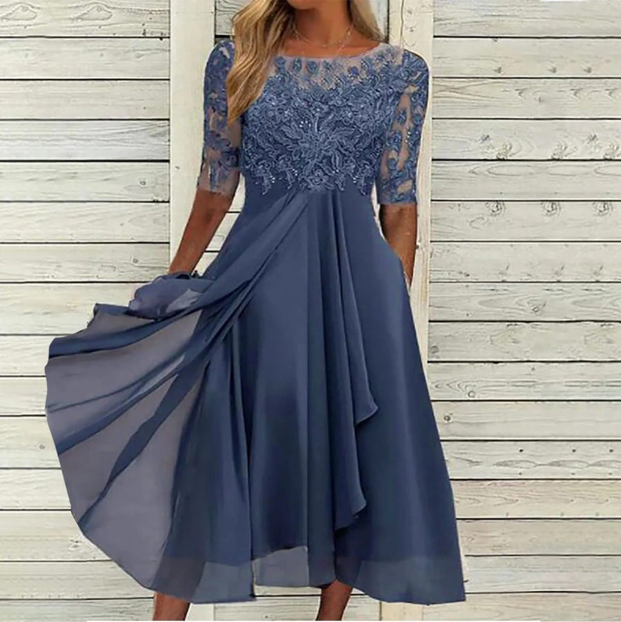 Robe mi-longue à manches mi-longues et jupe fluide