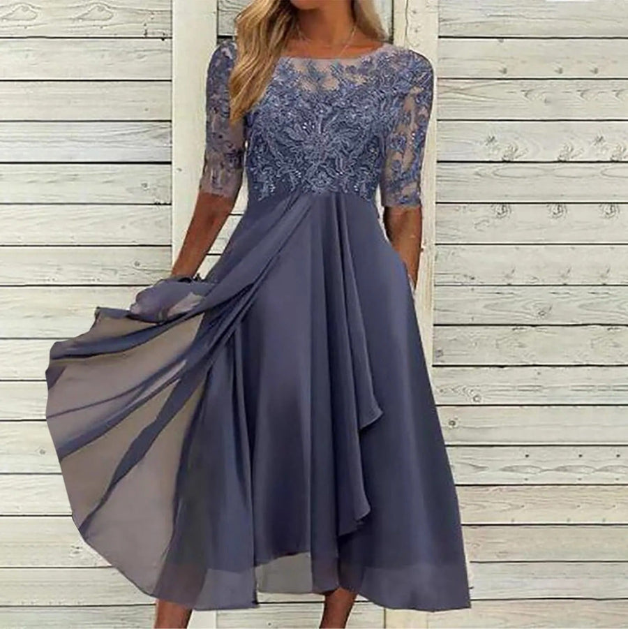 Robe mi-longue à manches mi-longues et jupe fluide