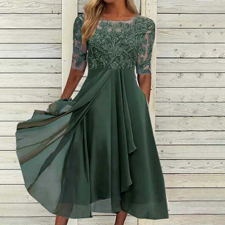 Robe mi-longue à manches mi-longues et jupe fluide