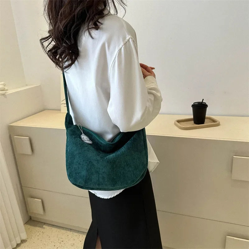 Sac d’épaule souple avec sangle longue et fermeture supérieure