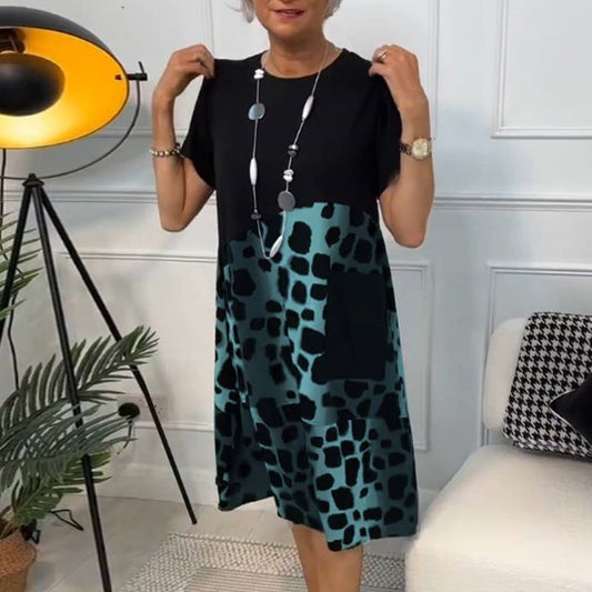 Robe courte à manches courtes avec encolure ronde et contraste visuel bicolore