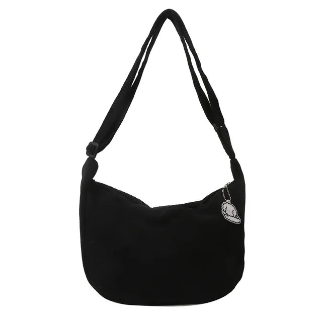 Sac d’épaule souple avec sangle longue et fermeture supérieure